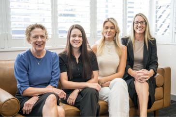 Four female property consultants